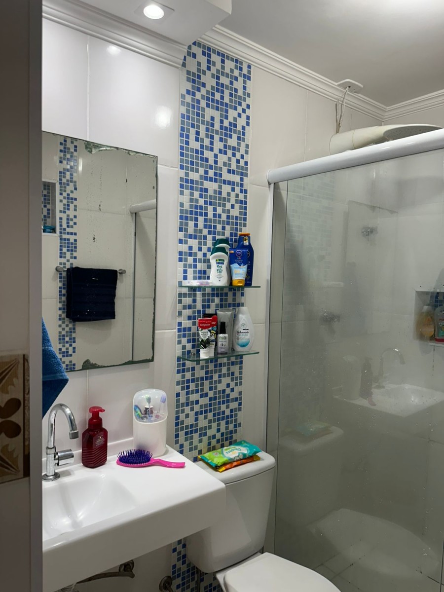 Apartamento à venda de um dormitório com garagem em São Vicente SP.