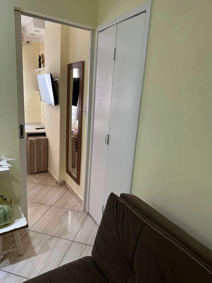 Apartamento à venda de um dormitório com garagem em São Vicente SP.