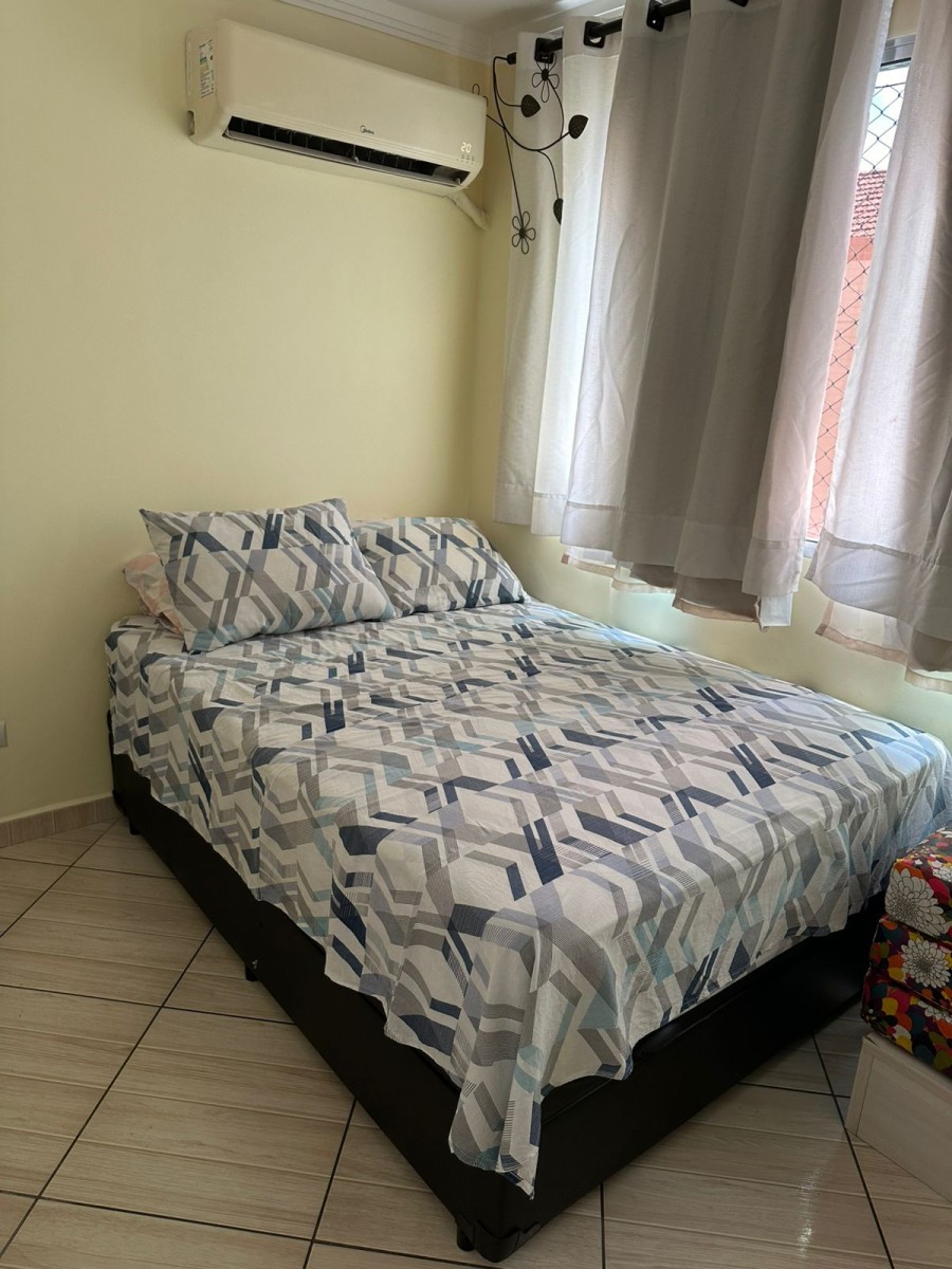 Apartamento à venda de um dormitório com garagem em São Vicente SP.