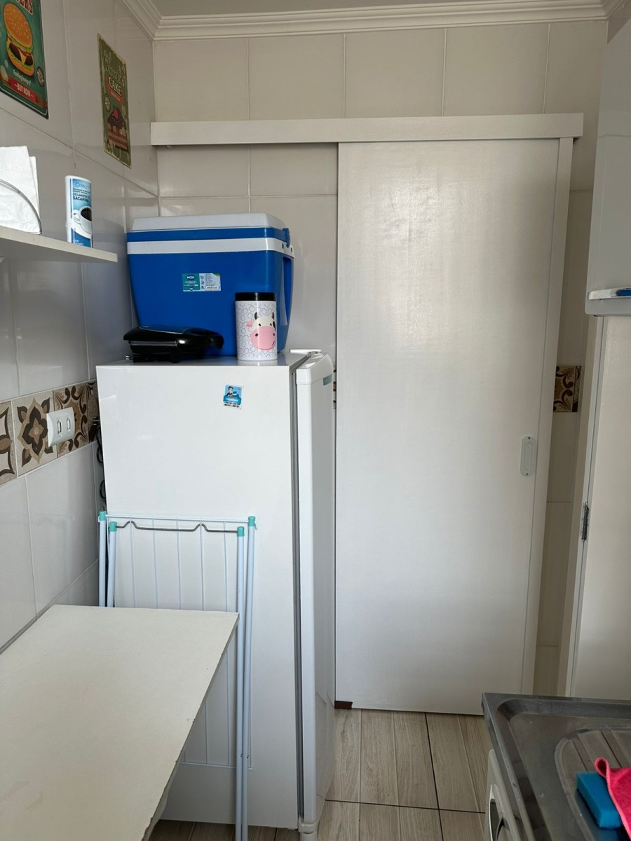 Apartamento à venda de um dormitório com garagem em São Vicente SP.