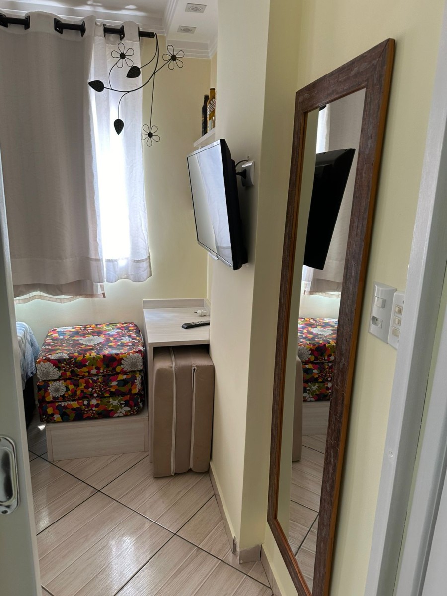 Apartamento à venda de um dormitório com garagem em São Vicente SP.