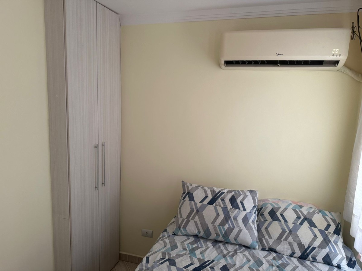 Apartamento à venda de um dormitório com garagem em São Vicente SP.