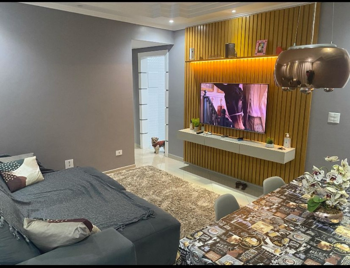 Apartamento de 2 dormitórios à venda com garagem em São Vicente SP.