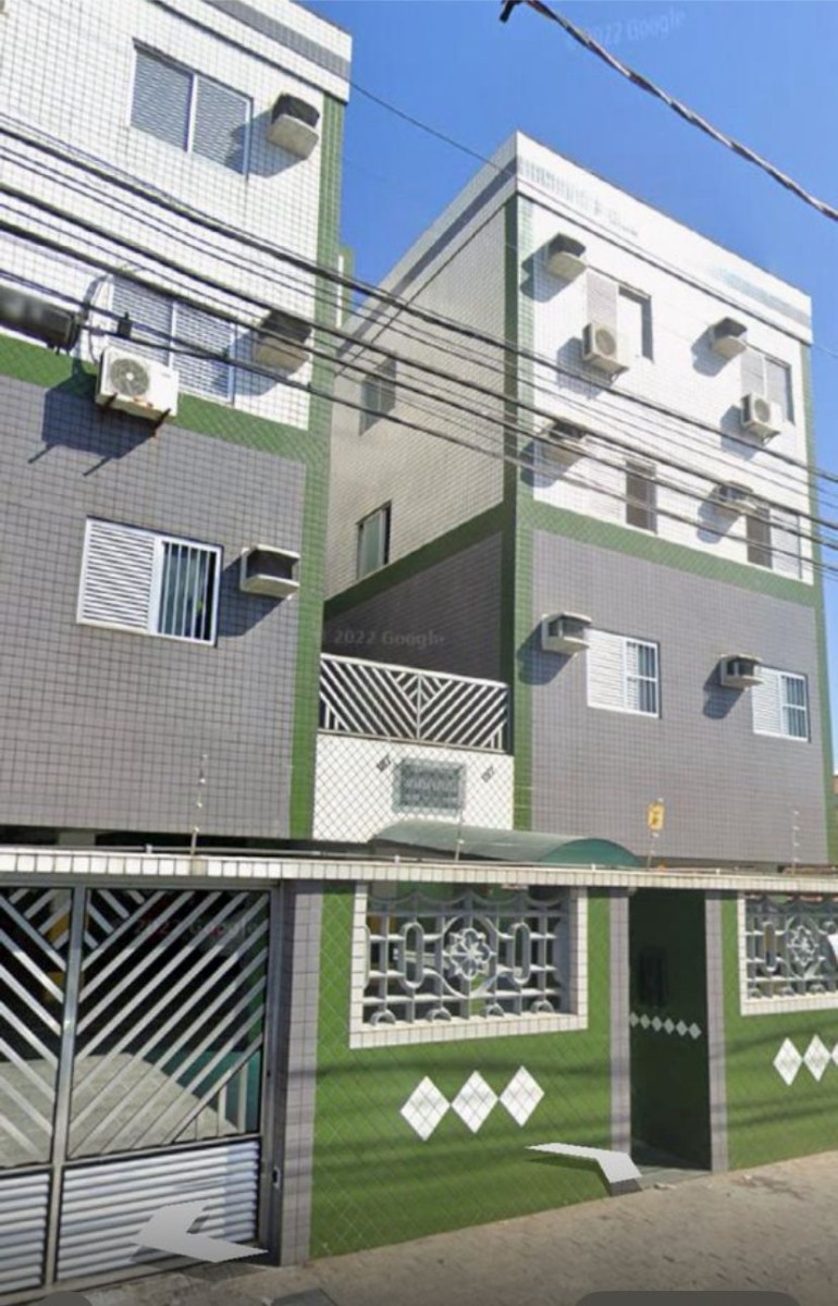 Apartamento de 2 dormitórios à venda com garagem em São Vicente SP.