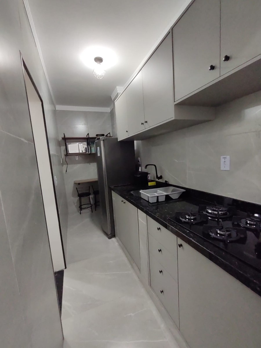 Apartamento à venda Sala Living, Praia do Gonzaguinha, Frente ao Shopping, com garagem em São Vicente-SP