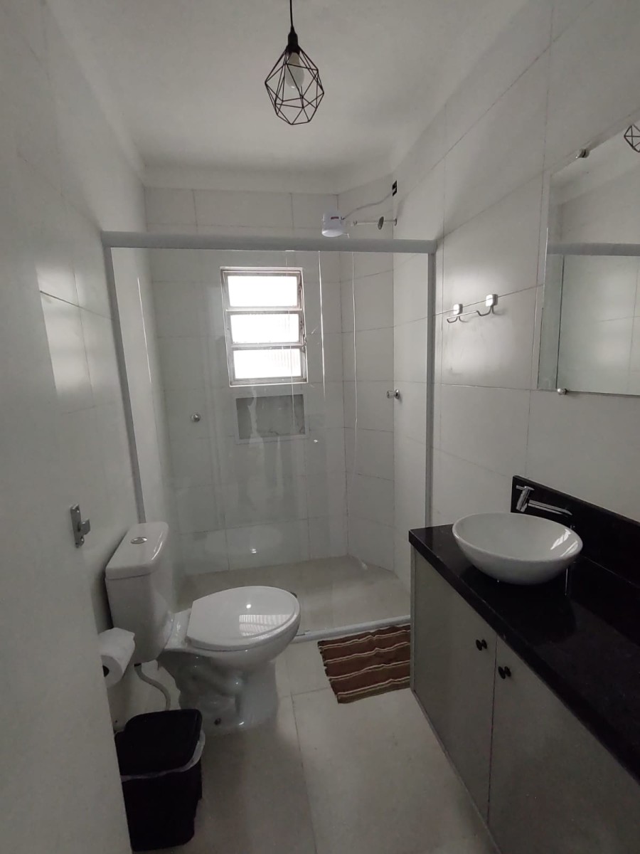 Apartamento à venda Sala Living, Praia do Gonzaguinha, Frente ao Shopping, com garagem em São Vicente-SP