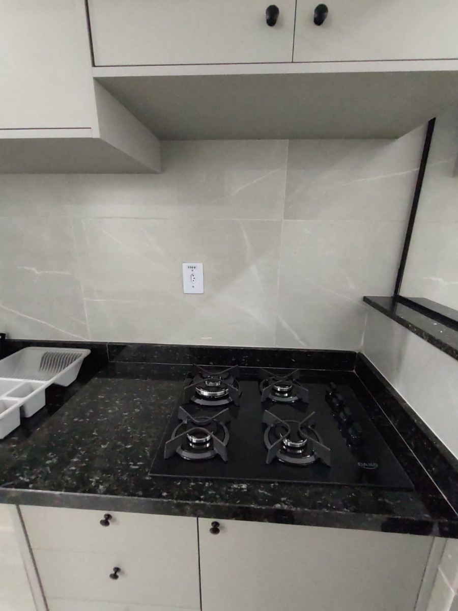 Apartamento à venda Sala Living, Praia do Gonzaguinha, Frente ao Shopping, com garagem em São Vicente-SP