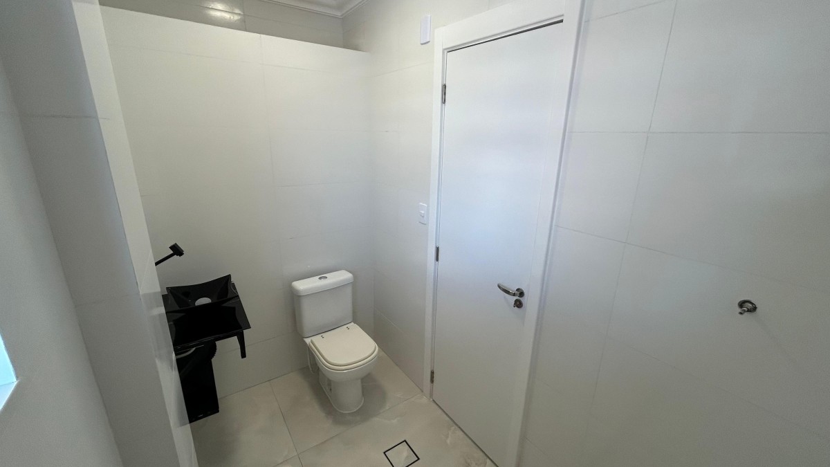 Apartamento à venda de 1 dormitório com garagem em São Vicente/SP.