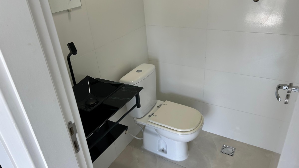 Apartamento à venda de 1 dormitório com garagem em São Vicente/SP.