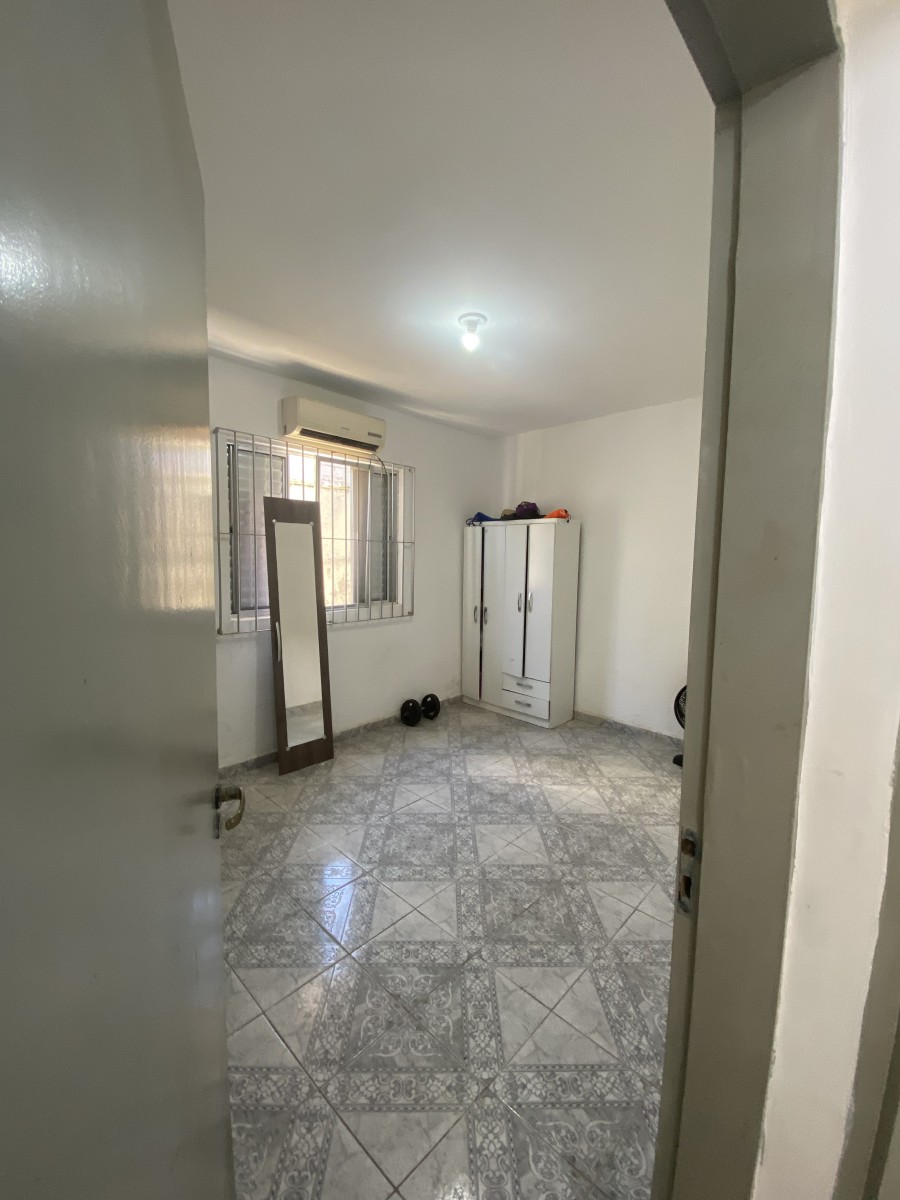 Apartamento à Venda no Coração de Santos - SP – Térreo com Garagem e 2 Quartos! - Macuco