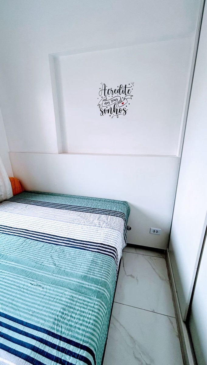 Apartamento à venda Sala Living com garagem em São Vicente/SP.