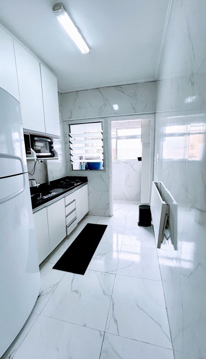 Apartamento à venda Sala Living com garagem em São Vicente/SP.