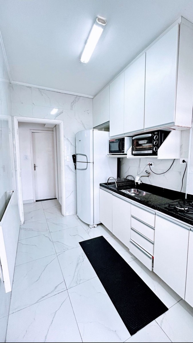 Apartamento à venda Sala Living com garagem em São Vicente/SP.