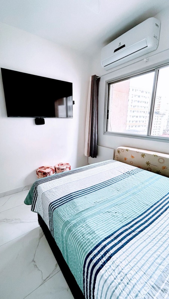 Apartamento à venda Sala Living com garagem em São Vicente/SP.