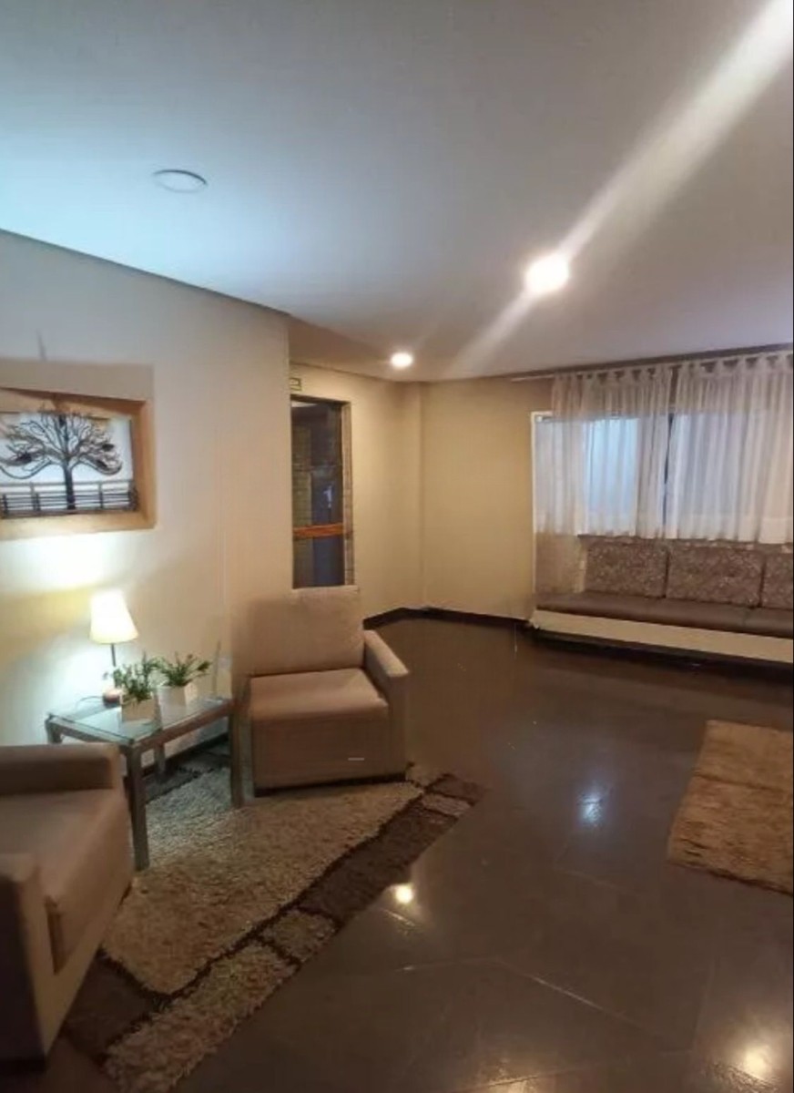 Apartamento à venda Sala Living com garagem em São Vicente/SP.