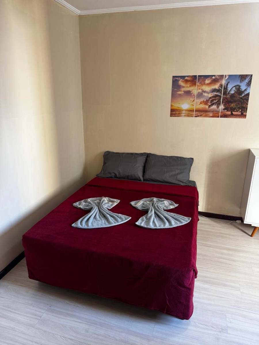 Apartamento à Venda na Praia do Gonzaguinha – 1 Dormitório Mobiliado Prédio Frente ao Mar