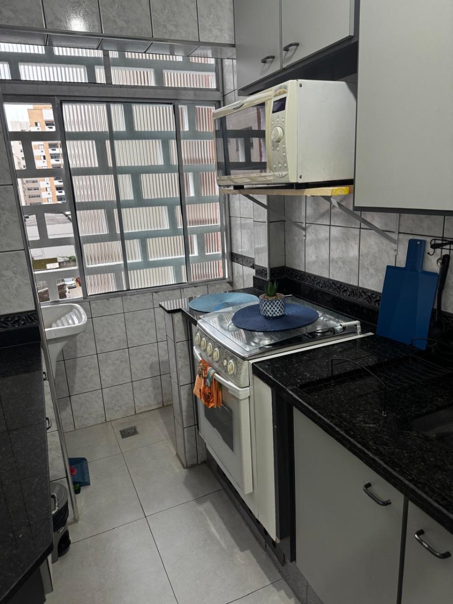 Apartamento à Venda na Praia do Gonzaguinha – 1 Dormitório Mobiliado Prédio Frente ao Mar
