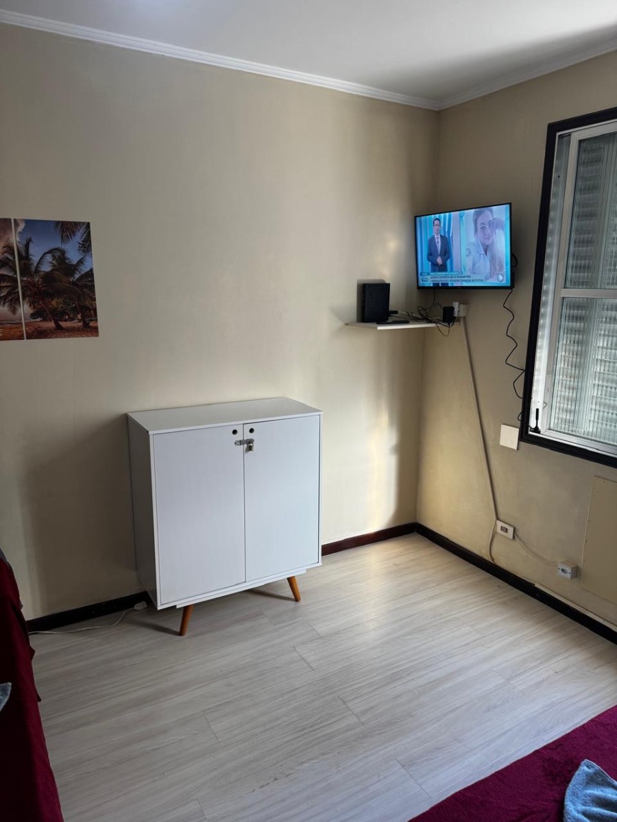 Apartamento à Venda na Praia do Gonzaguinha – 1 Dormitório Mobiliado Prédio Frente ao Mar