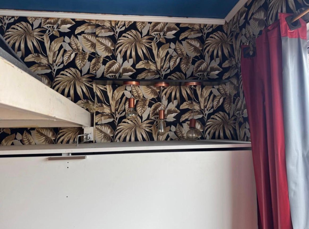 Apartamento à venda sala living com garagem em São Vicente/SP.