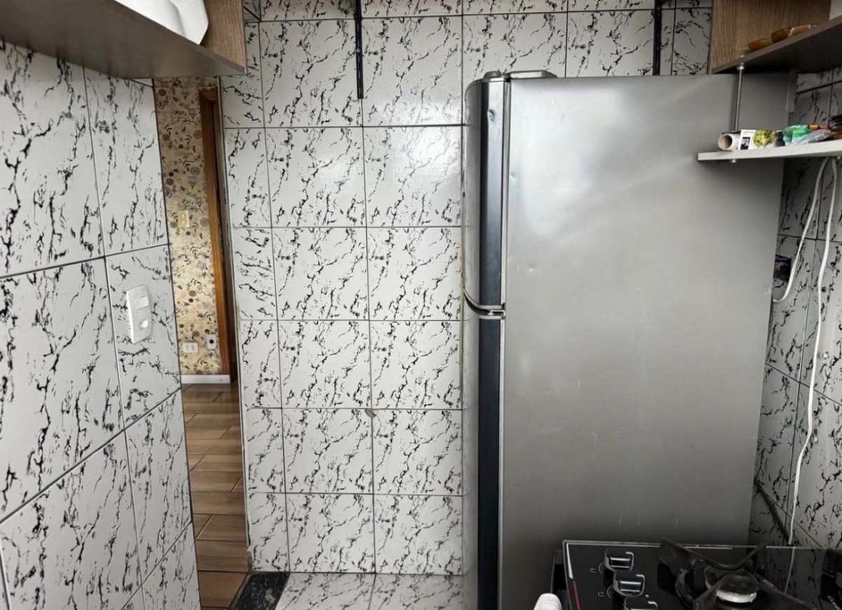 Apartamento à venda sala living com garagem em São Vicente/SP.