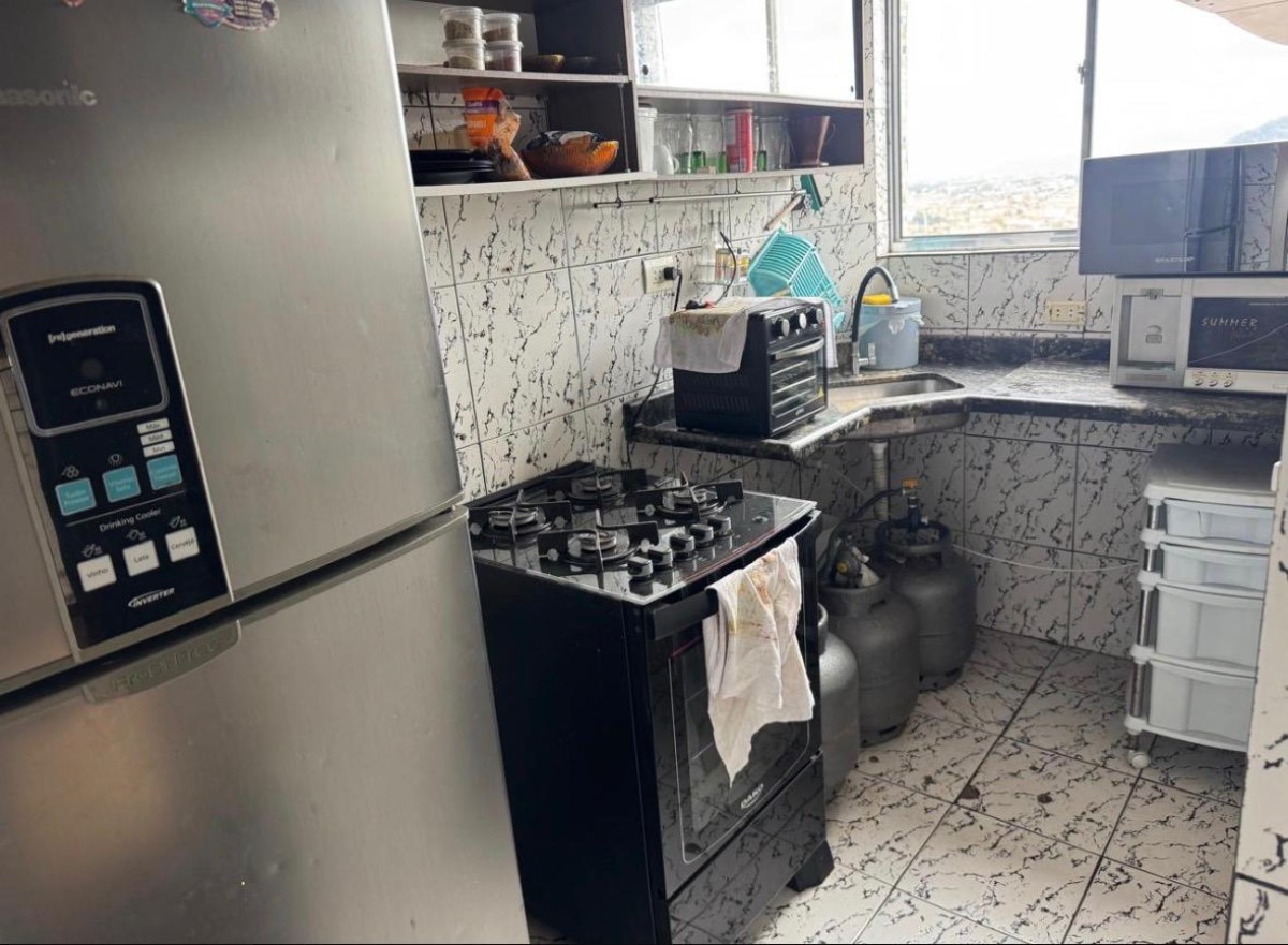 Apartamento à venda sala living com garagem em São Vicente/SP.