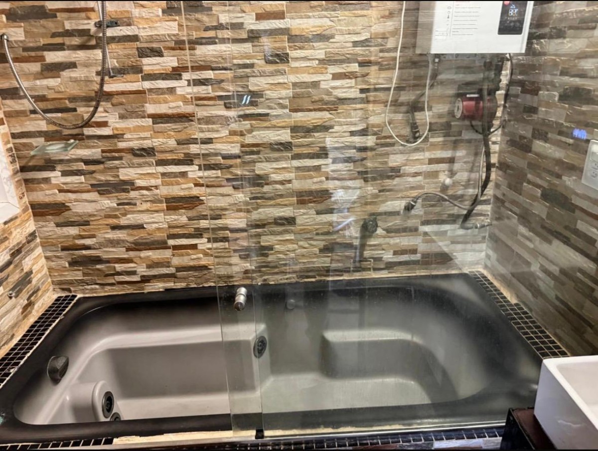 Apartamento à venda sala living com garagem em São Vicente/SP.