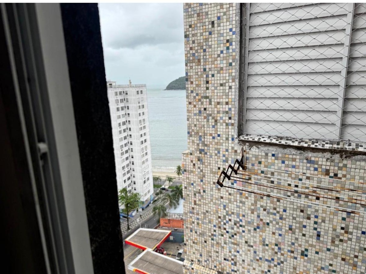 Apartamento à venda sala living com garagem em São Vicente/SP.