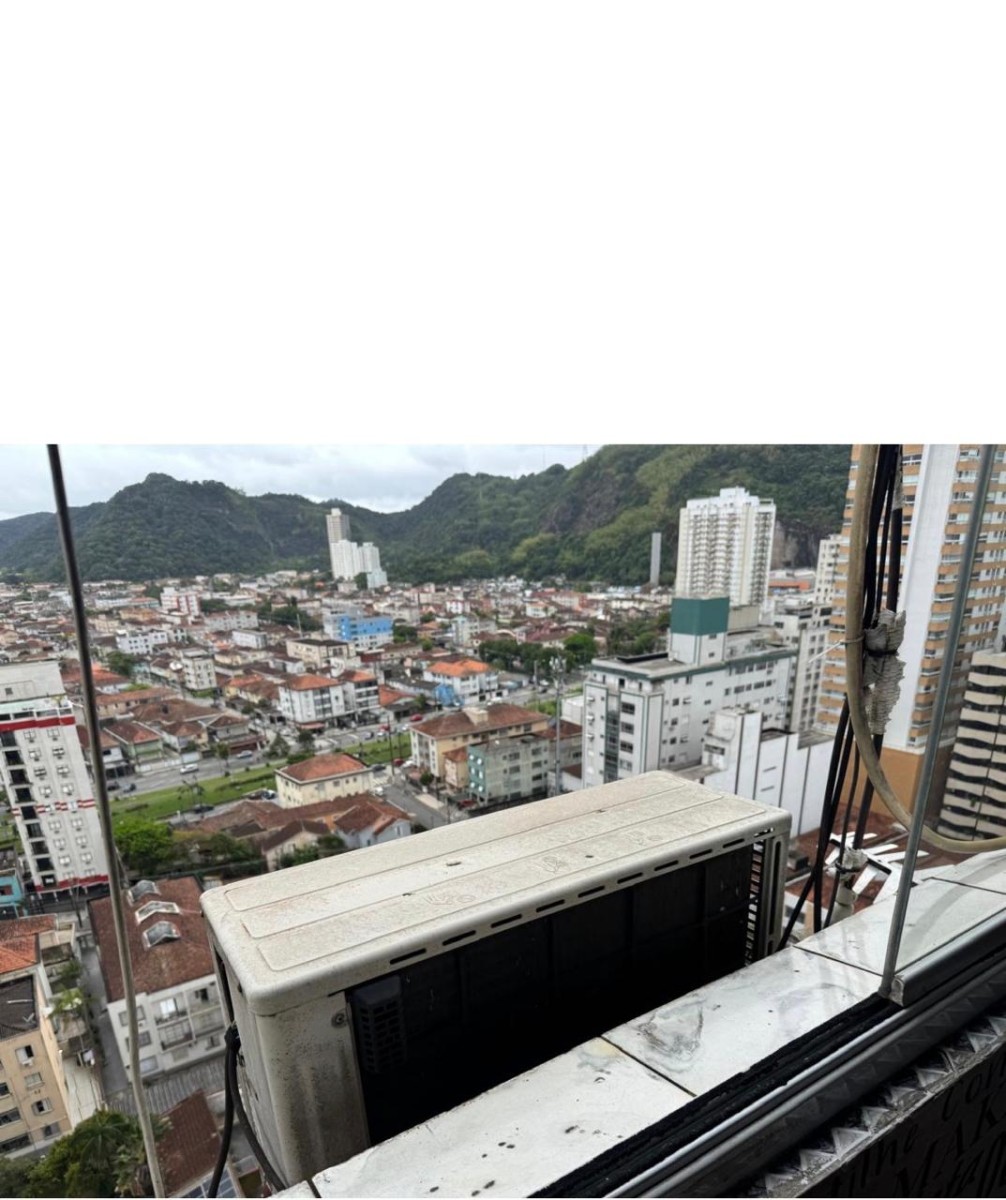 Apartamento à venda sala living com garagem em São Vicente/SP.