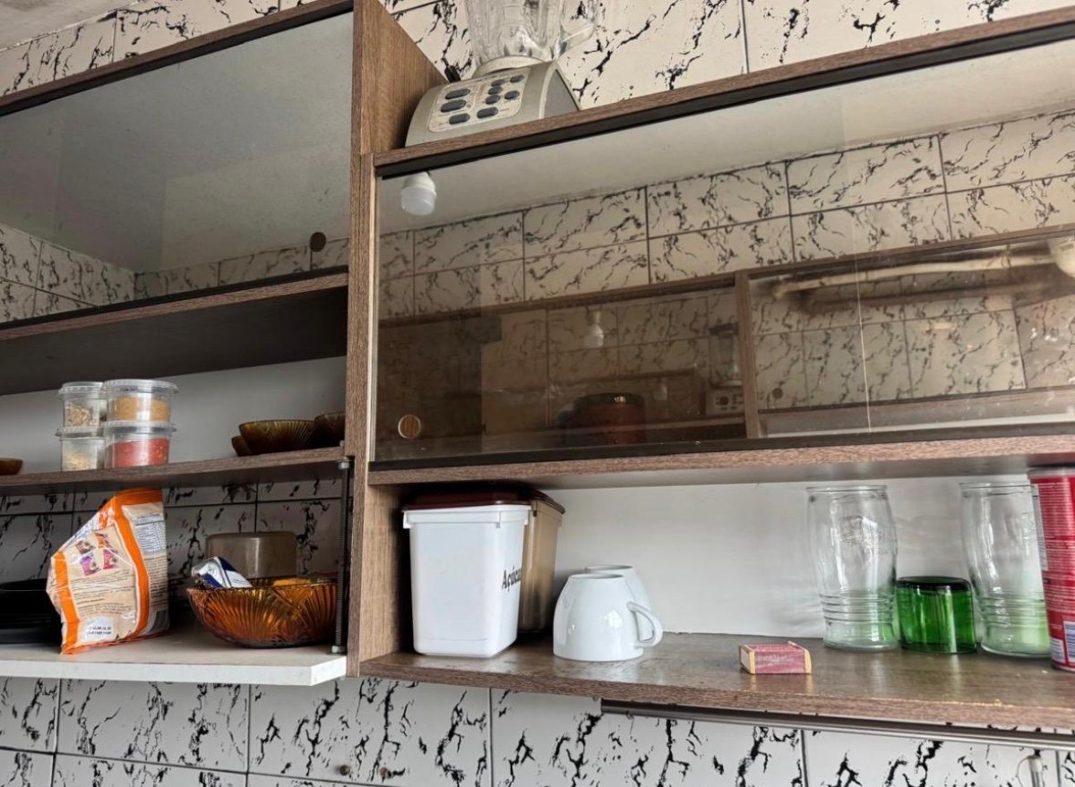 Apartamento à venda sala living com garagem em São Vicente/SP.