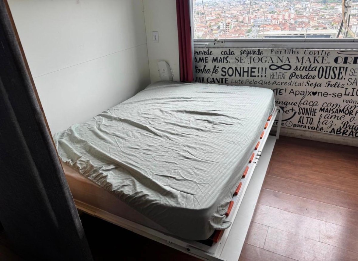 Apartamento à venda sala living com garagem em São Vicente/SP.