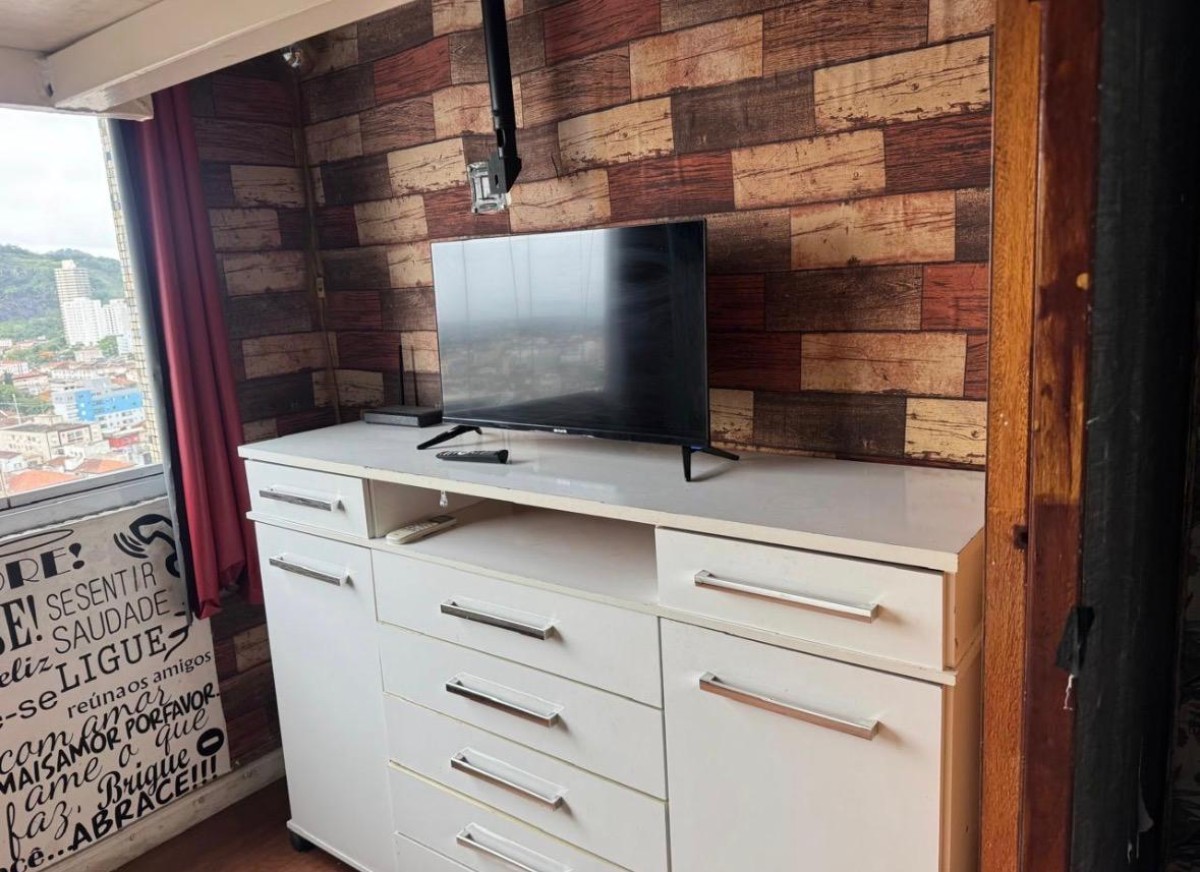 Apartamento à venda sala living com garagem em São Vicente/SP.