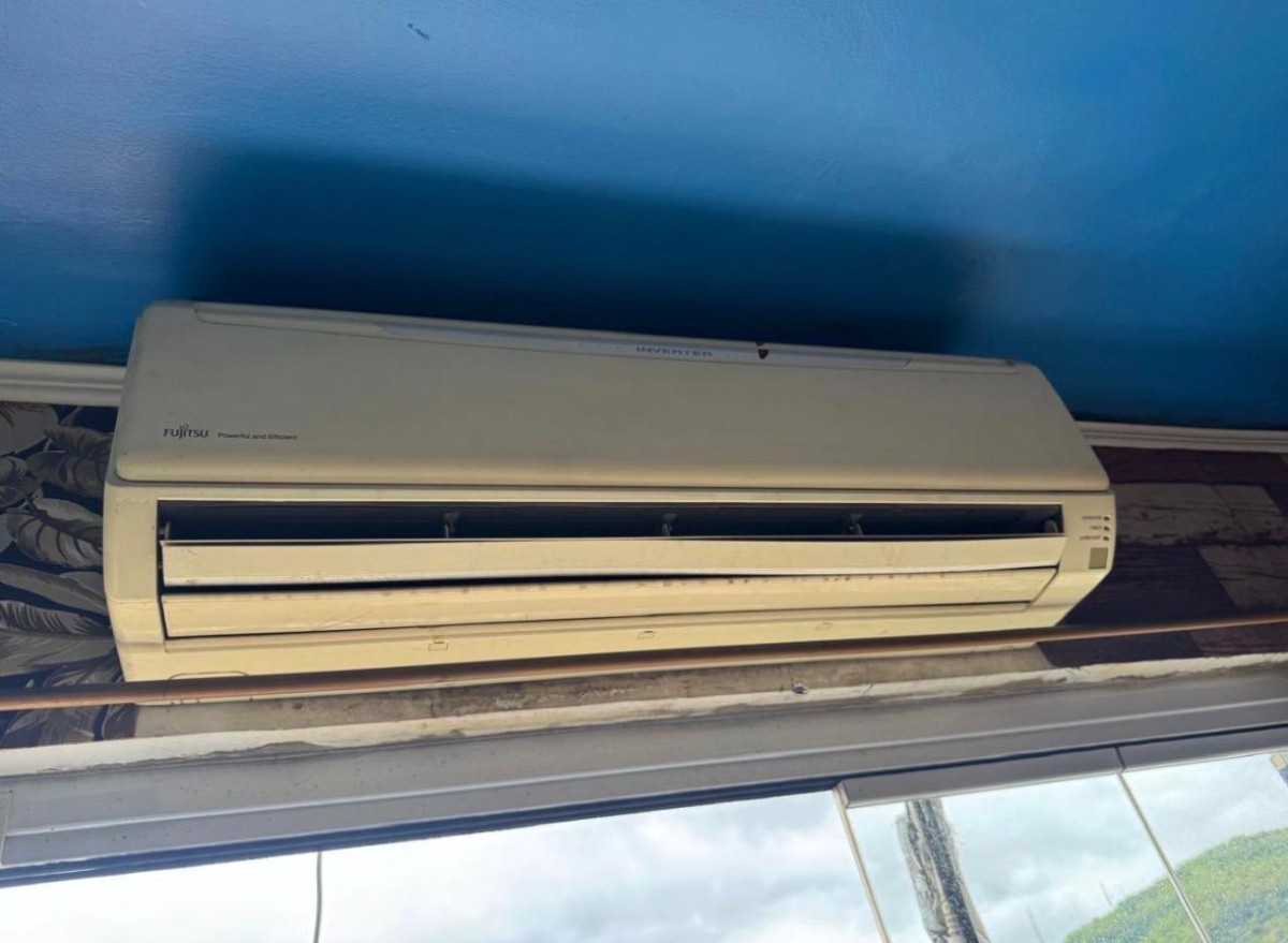 Apartamento à venda sala living com garagem em São Vicente/SP.