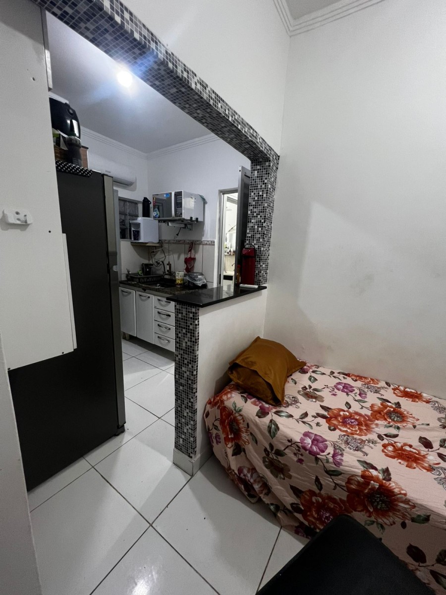 Apartamento à venda de 1 dormitório com garagem em São Vicente/SP.