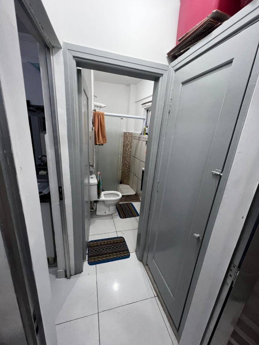 Apartamento à venda de 1 dormitório com garagem em São Vicente/SP.