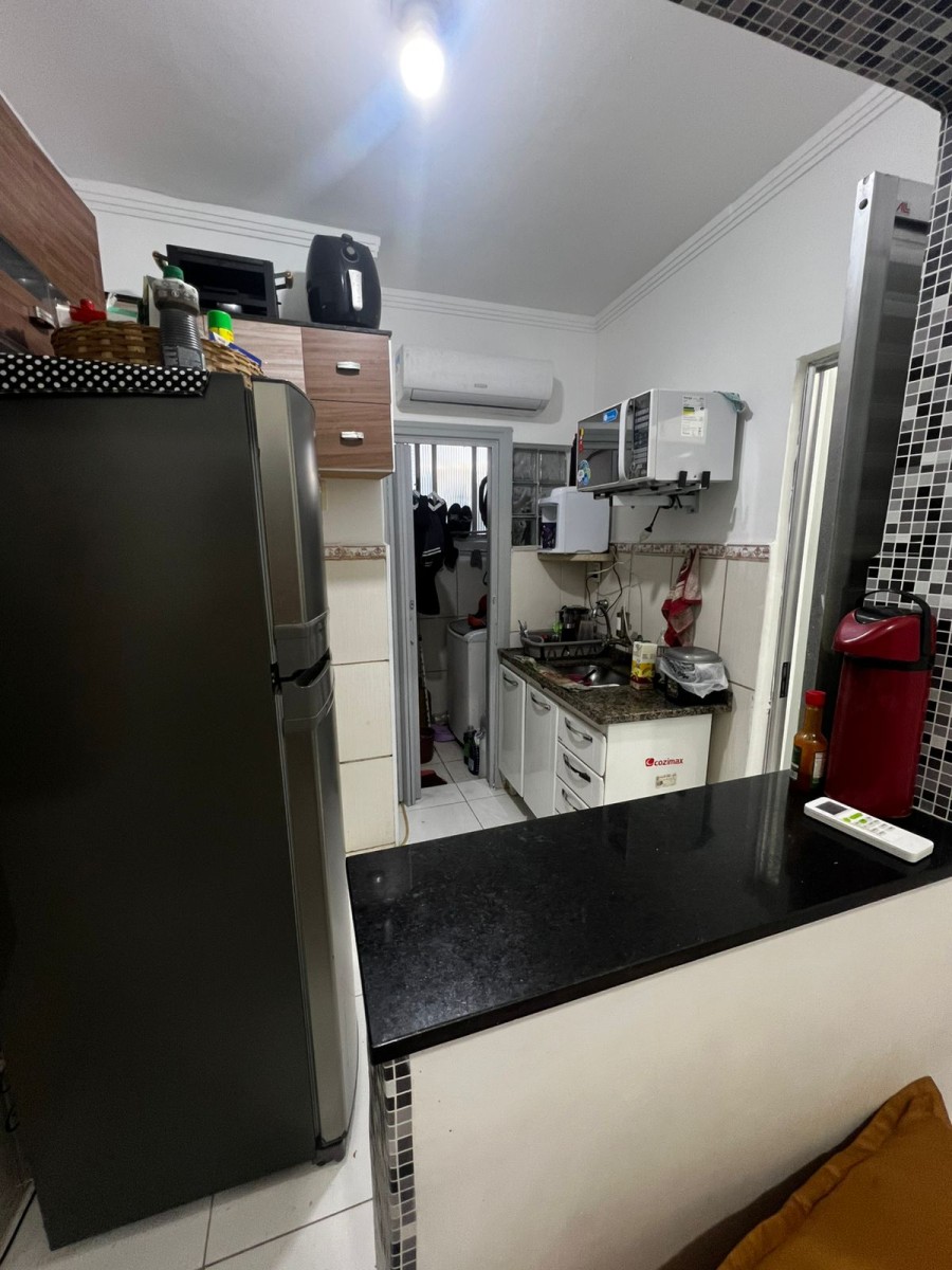 Apartamento à venda de 1 dormitório com garagem em São Vicente/SP.
