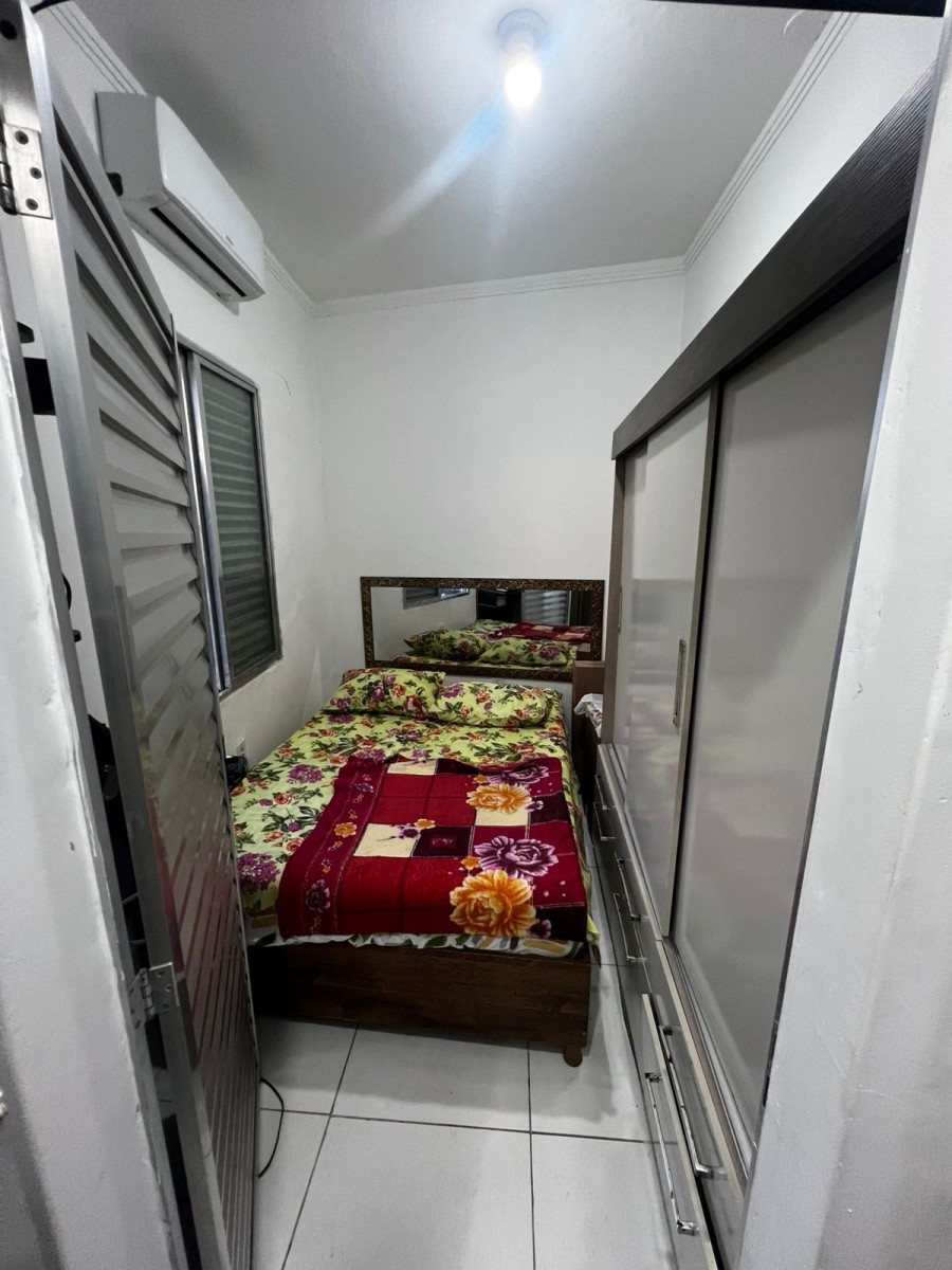 Apartamento à venda de 1 dormitório com garagem em São Vicente/SP.