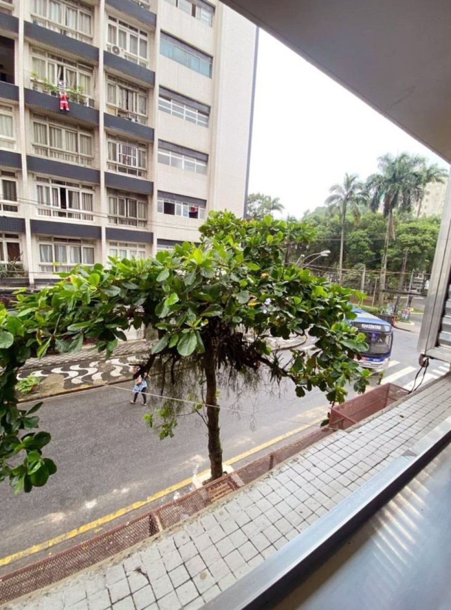 Apartamento à venda sala living, com garagem em São Vicente/SP.