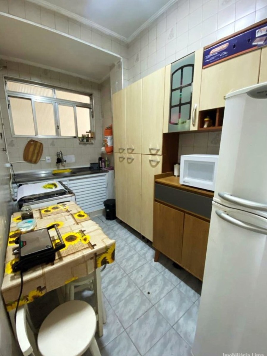 Apartamento à venda sala living, com garagem em São Vicente/SP.