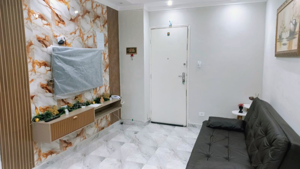 Apartamento de 1 dormitório à venda com garagem em São Vicente/SP