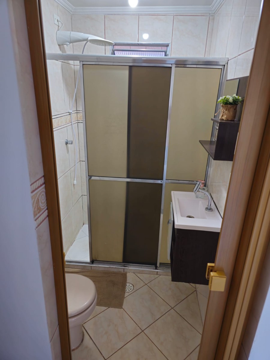 Apartamento à venda de 1 dormitório com garagem em São Vicente/SP