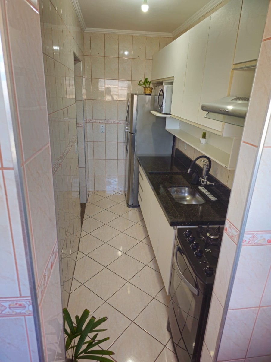 Apartamento à venda de 1 dormitório com garagem em São Vicente/SP