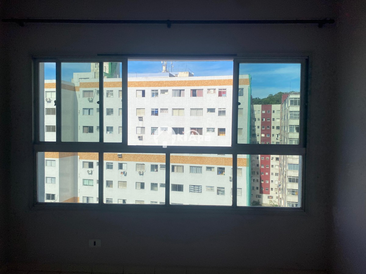Apartamento à Venda [ Estilo Sala Living ] – Centro São Vicente | Frente Shopping Brisamar | 1 Vaga Privativa | Próximo